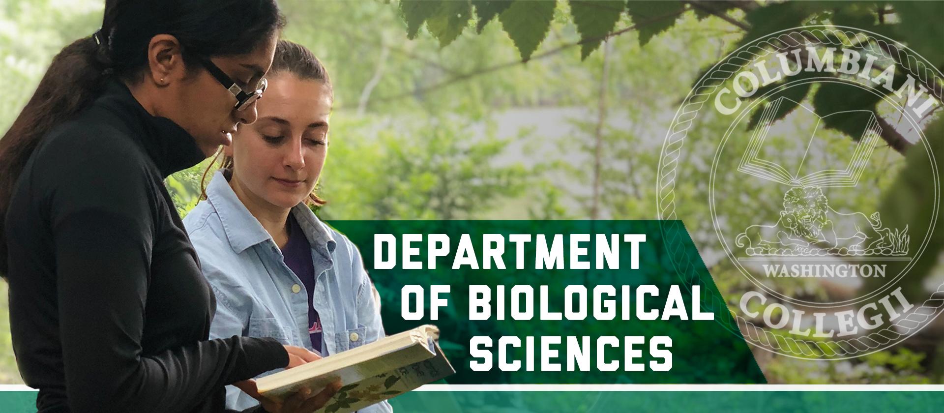 Department of Biological Sciences, George Washington University. Image of two students reading a book outside with green trees in the background